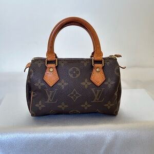 Louis Vuitton Mini Speedy Bag in Monogram with Vachetta leather